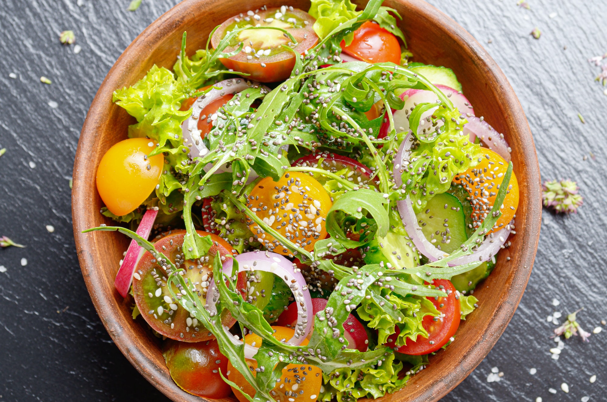 Top view at Vegetable salad of lettuce, cherry tomatoes, radish,